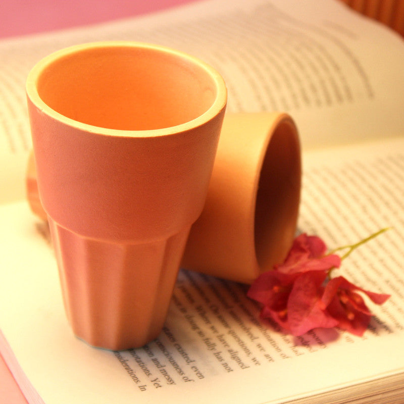 Rustic Terracotta Ceramic Cups with Fluted Design.
