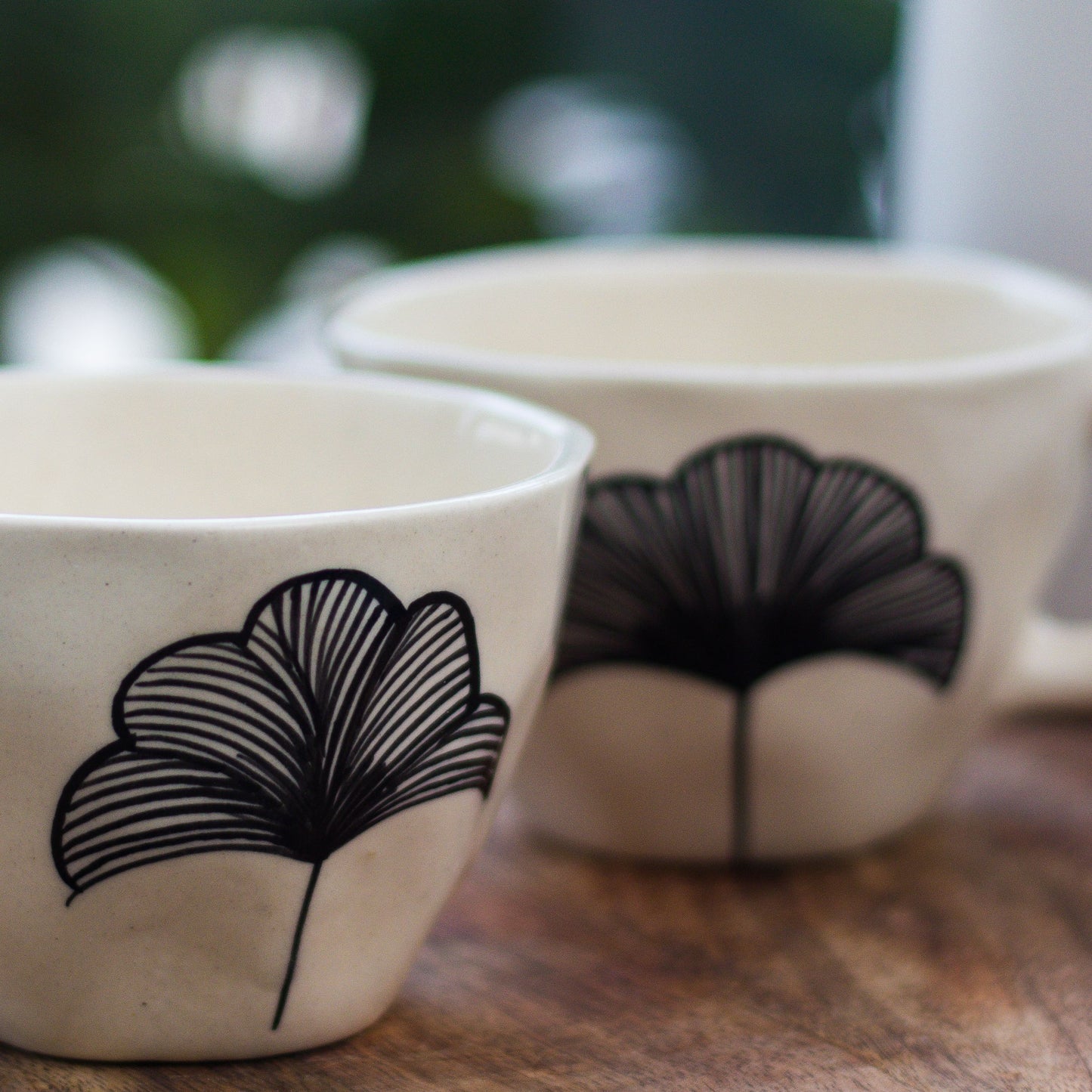 Handcrafted Ceramic Mugs with Black Flower Design, Set of 2