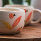 Handcrafted Ceramic cups with Orange Flower Design